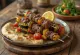 Grillad kebab serverad med grönsaker