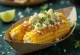 Elote med lime, färsk majs med majonnäsblandning och parmesan