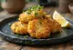 Glutenfria Bolinho de bacalhau, gyllenbruna torskbollar serverade