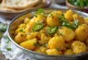 Aloo gobi med chili, serverad med färsk koriander